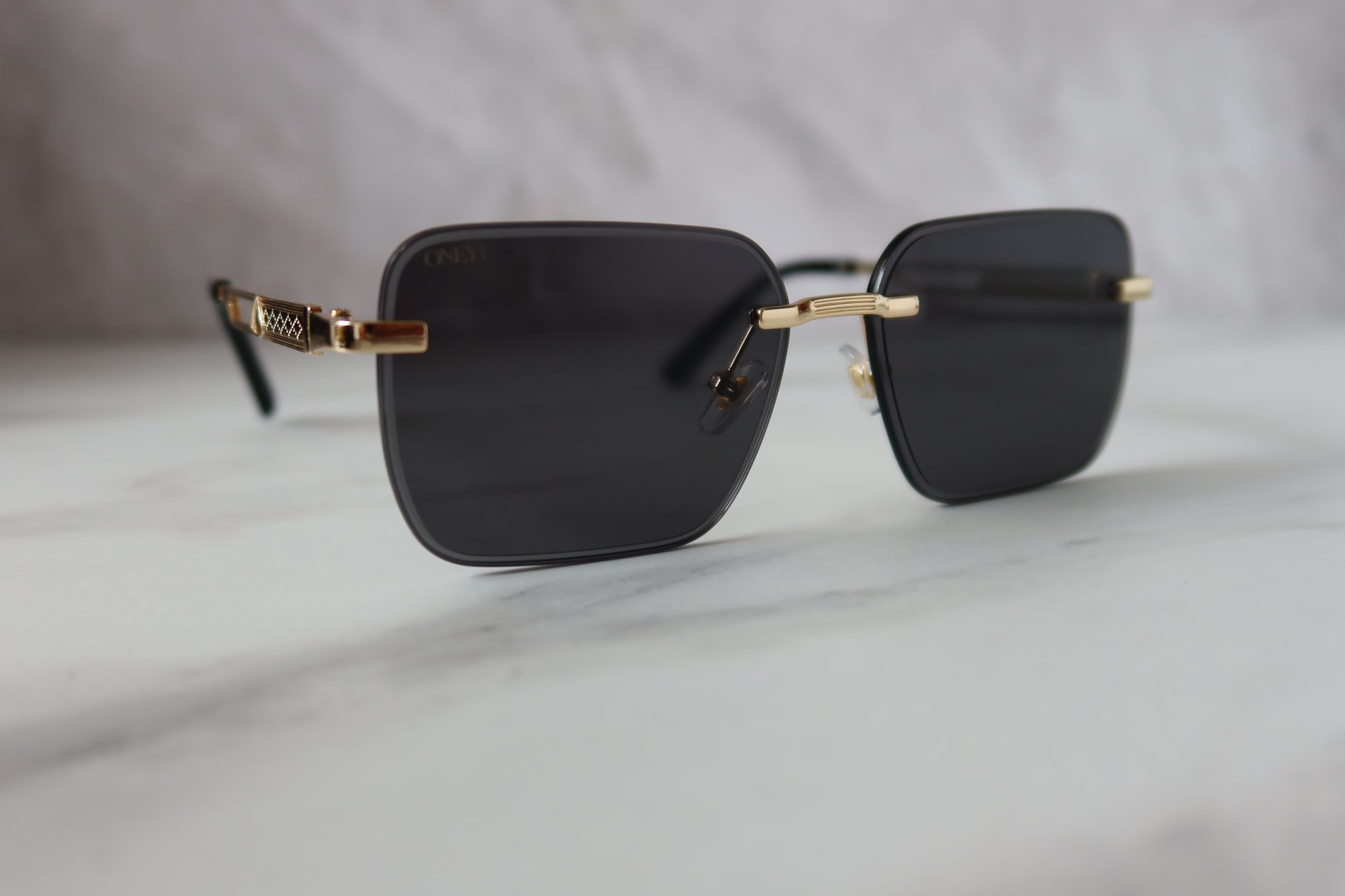 Maria - Rimless Rounded Rectangle Sunglasses