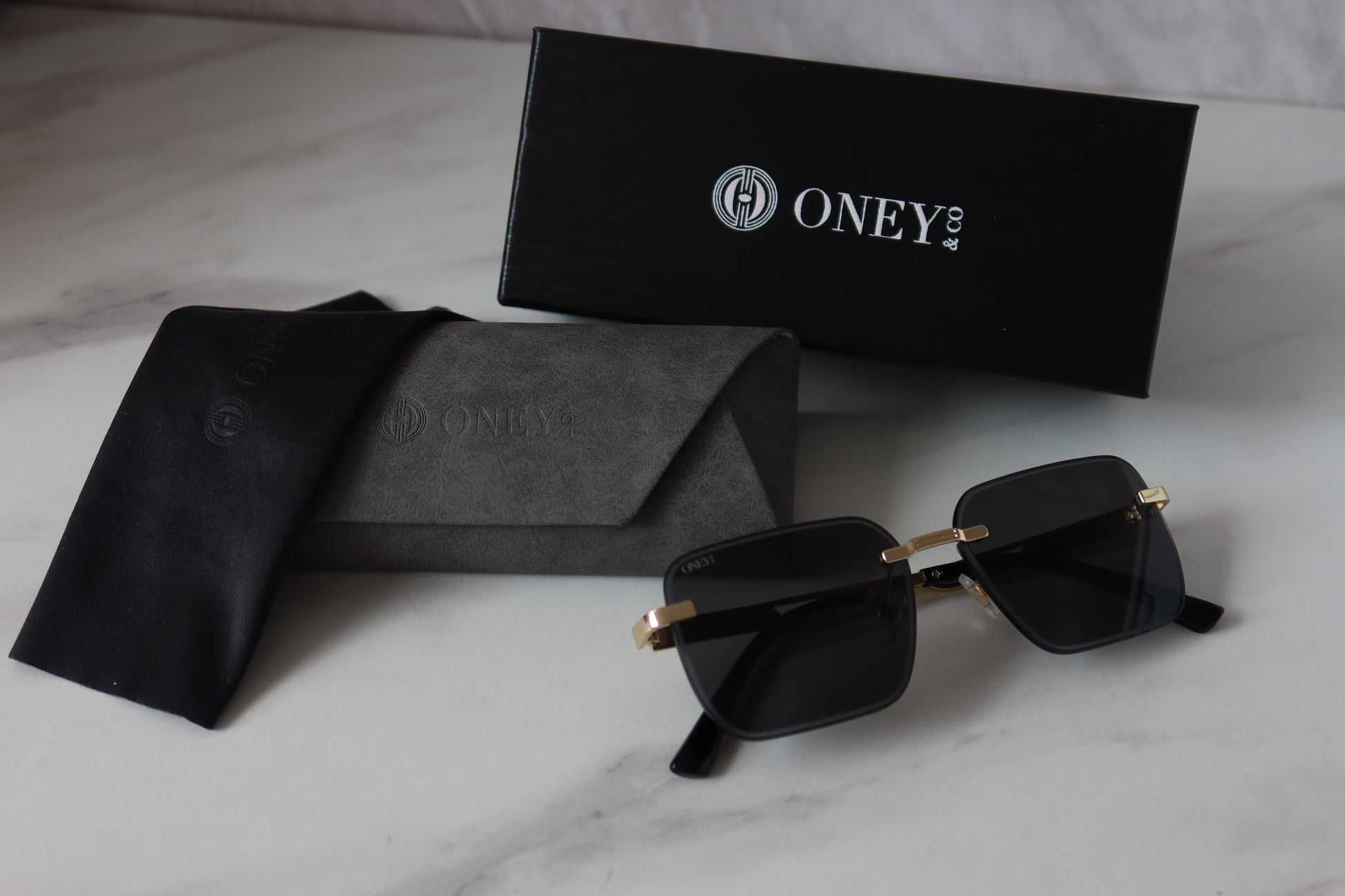 Maria - Rimless Rounded Rectangle Sunglasses