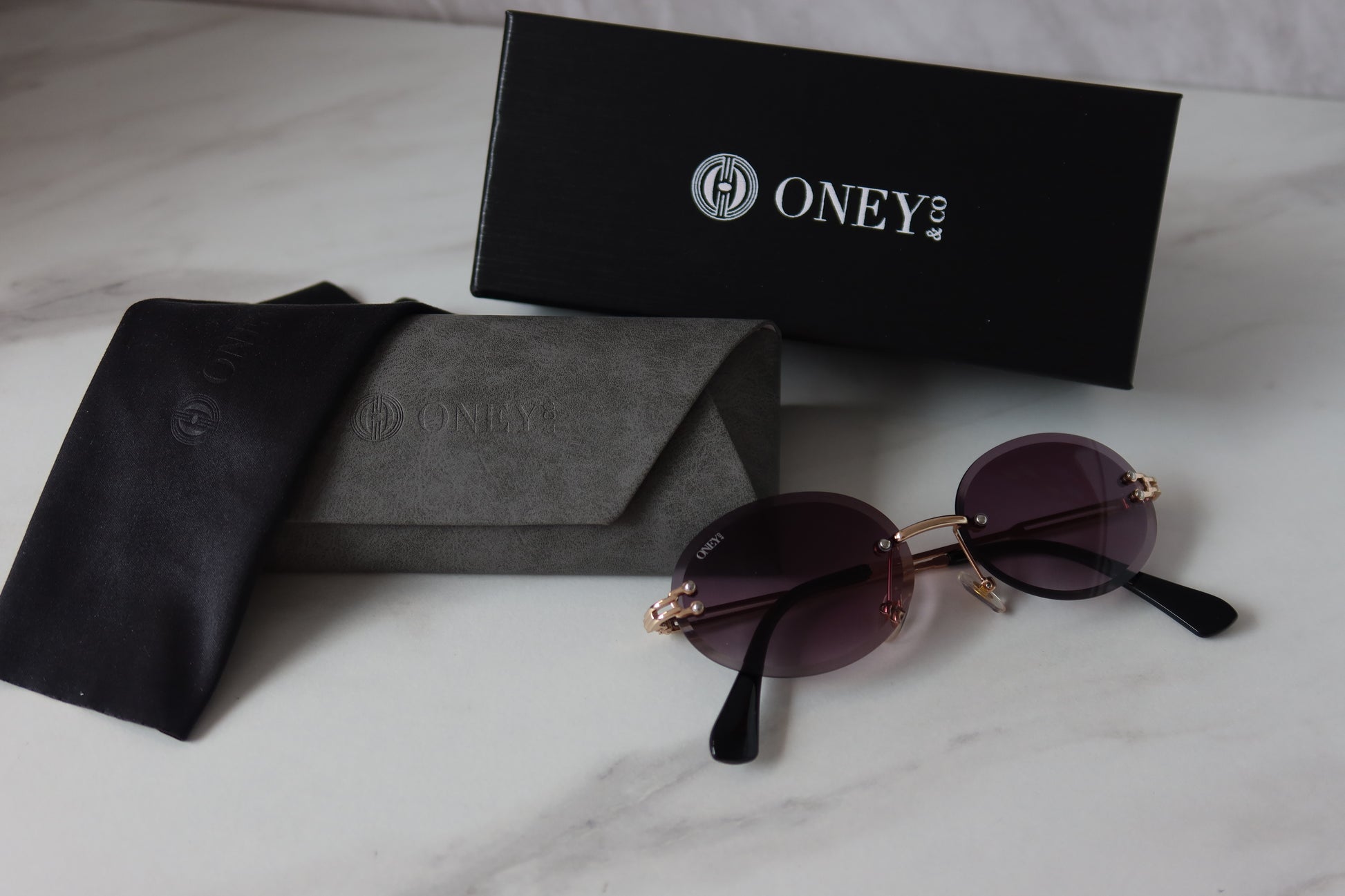 Maria - Rimless Retro Oval Sunglasses