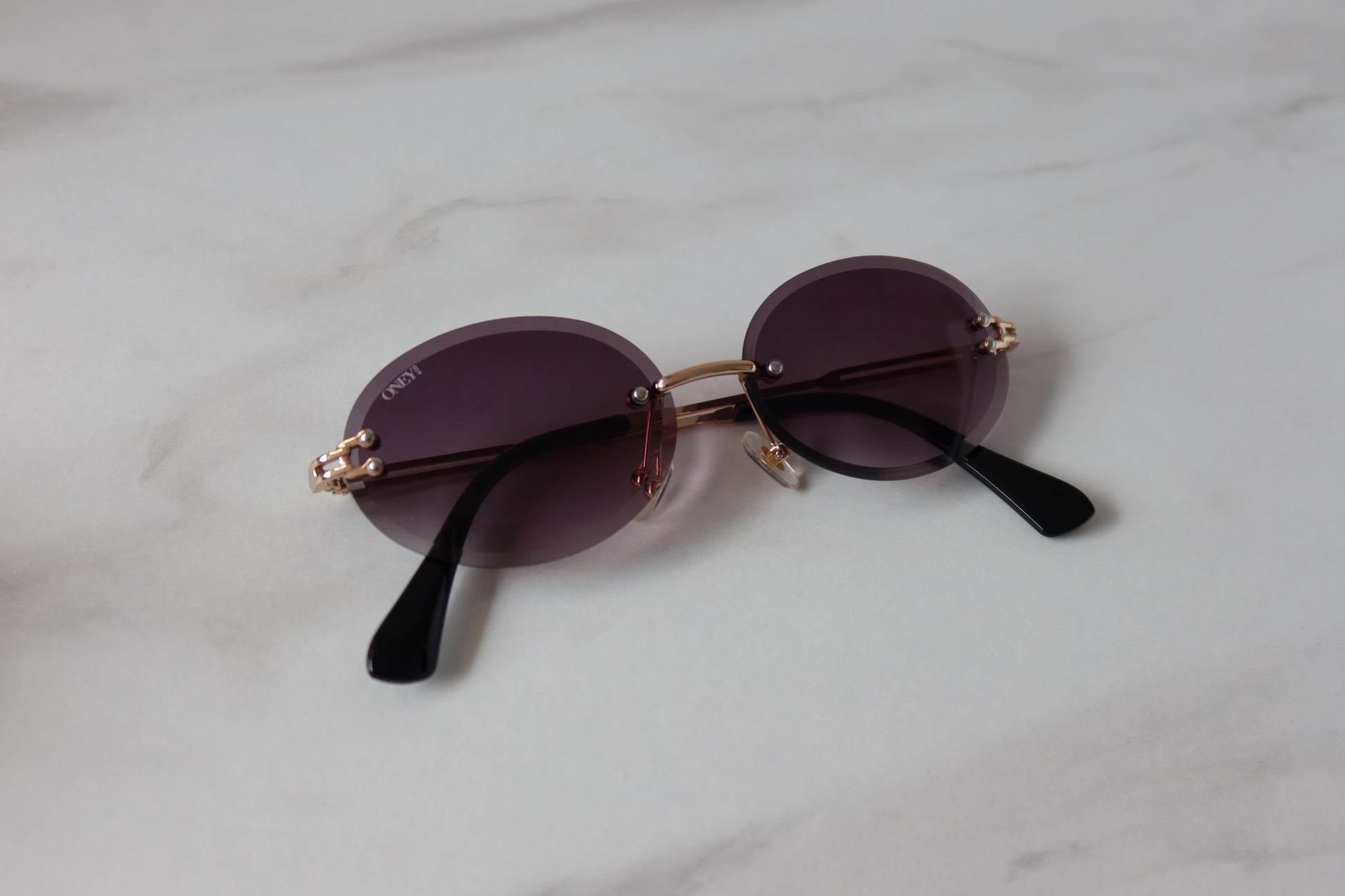 Maria - Rimless Retro Oval Sunglasses