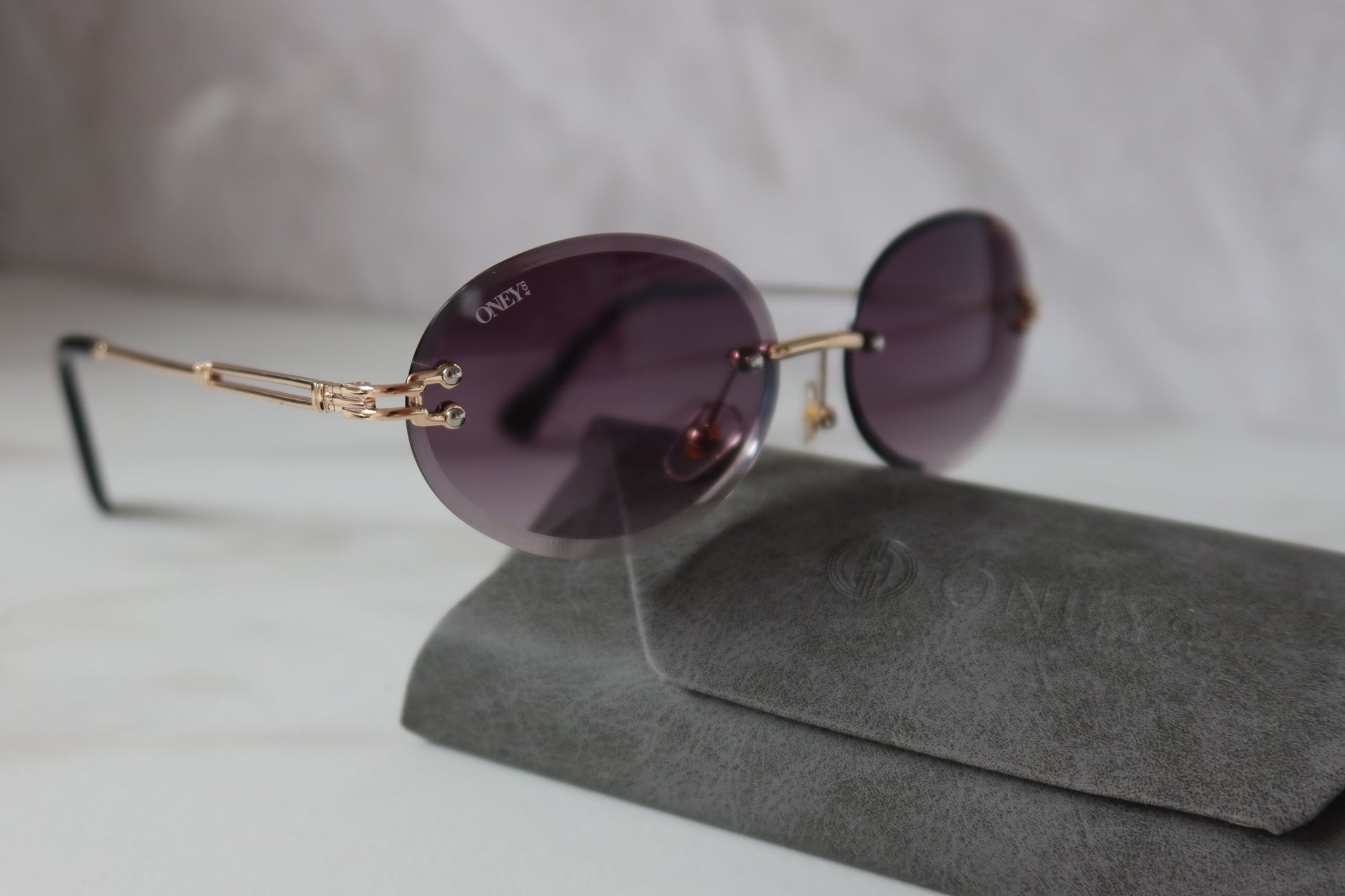 Maria - Rimless Retro Oval Sunglasses